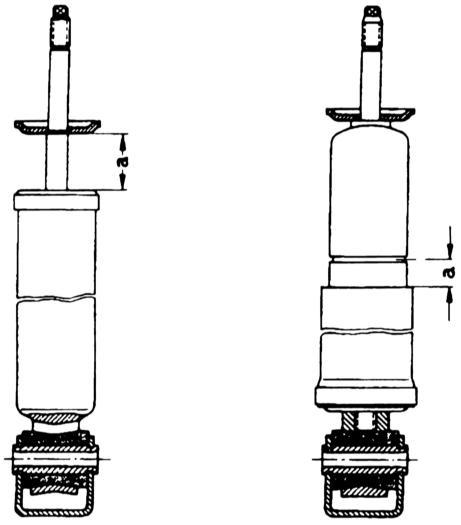Болти кріплення (показані стрілками) амортизатора до нижнього важеля